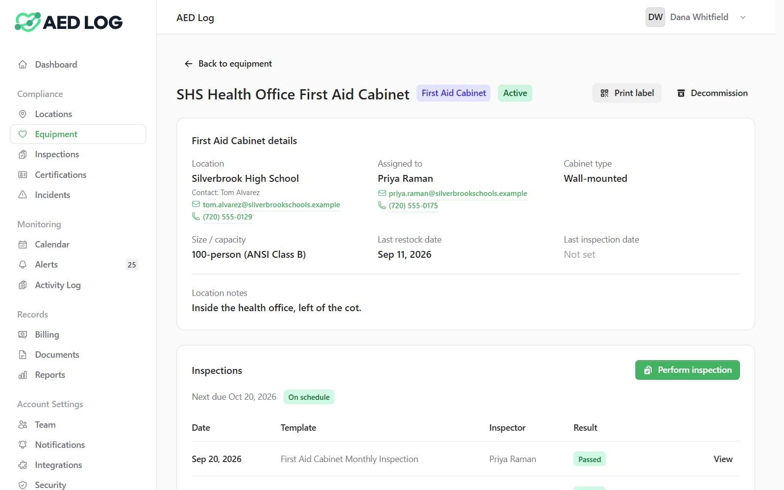 A first aid cabinet in AED Log with its size, last restock date and monthly inspection schedule